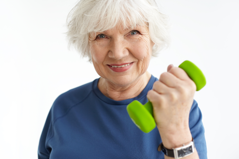 elderly woman lifting weights